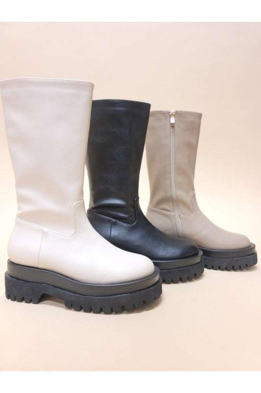 VENET-PLATFORM BOOTS in black, beige, and cream with side zippers and chunky soles.