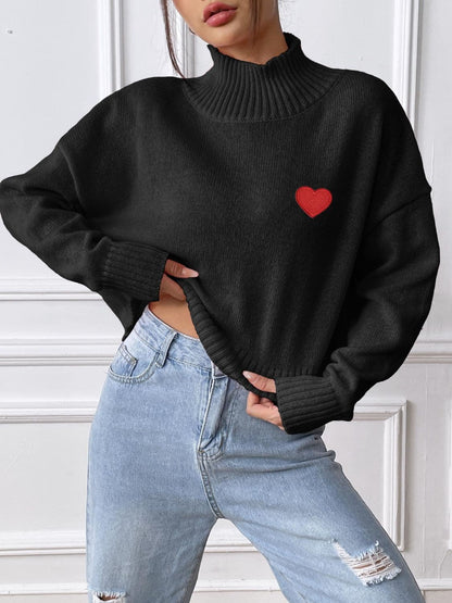 Charming heart turtleneck sweater for cozy elegance