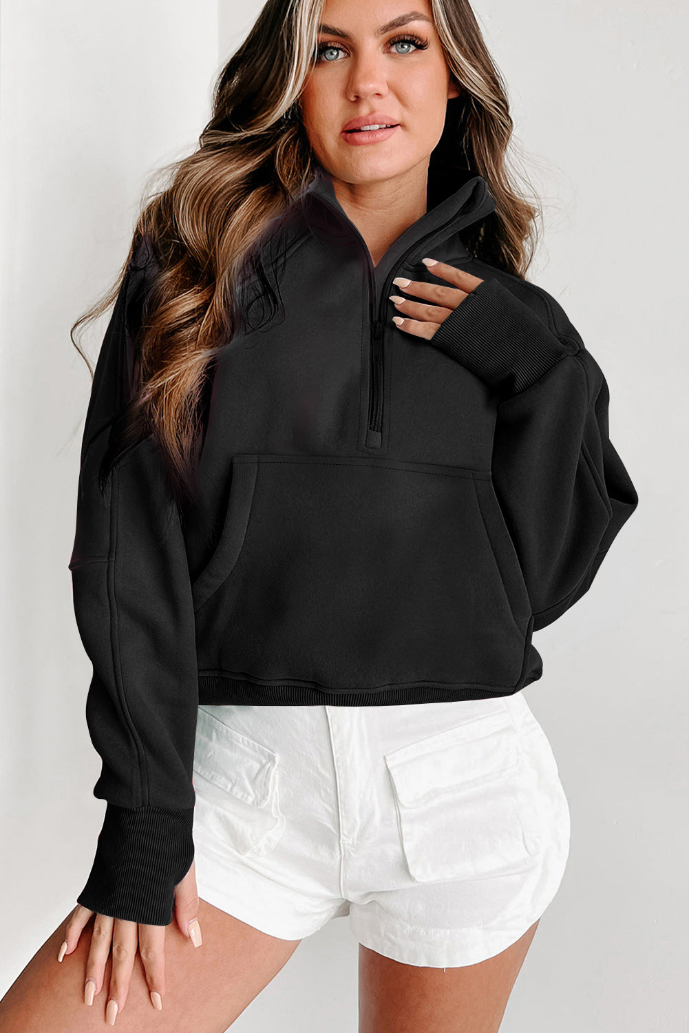 Chic black quarter zip sweatshirt with kangaroo pocket