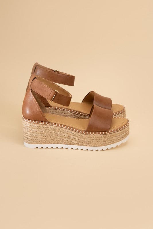 TUCKIN-S Platform Sandals.