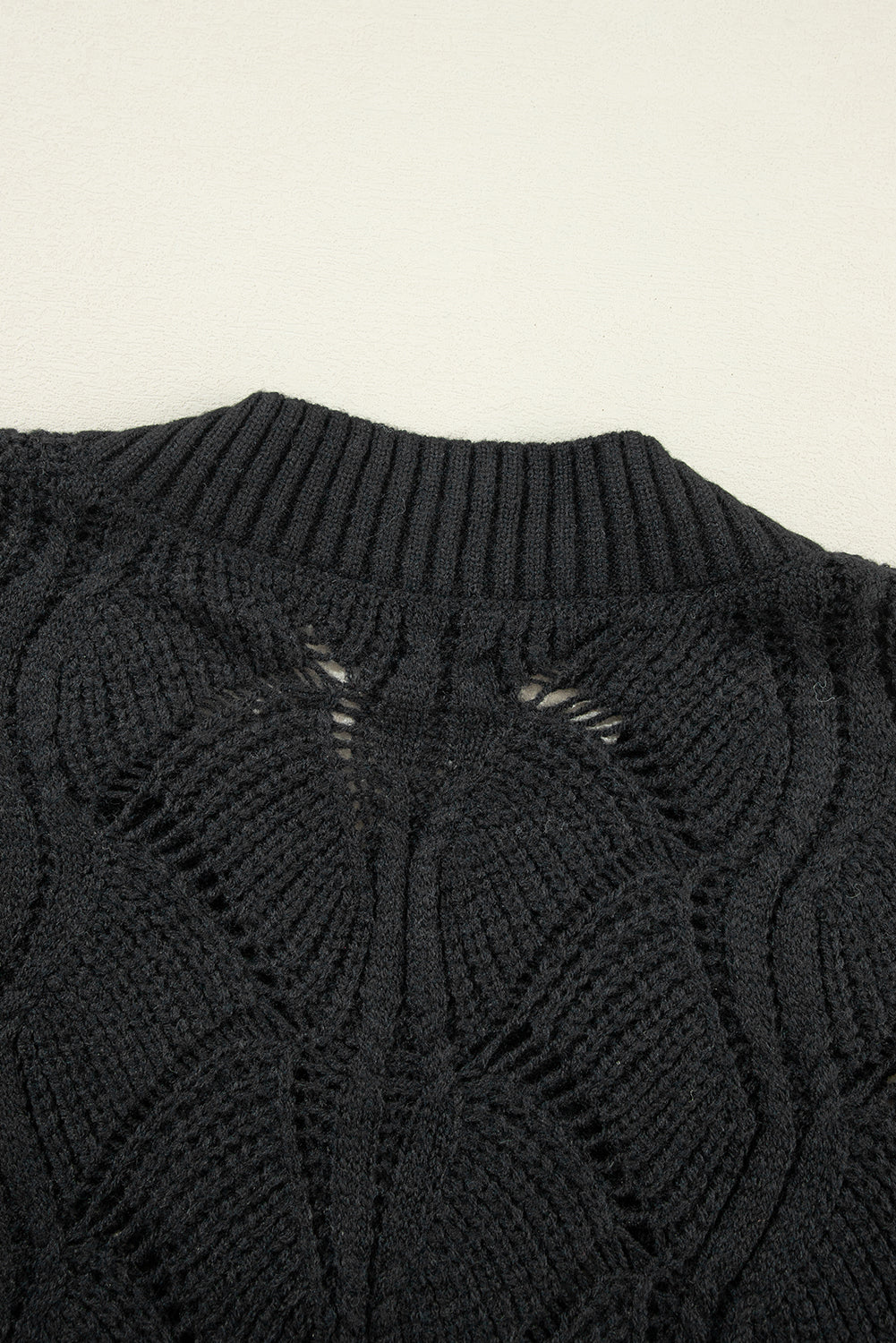 Chic black hollow knit v-neck sweater