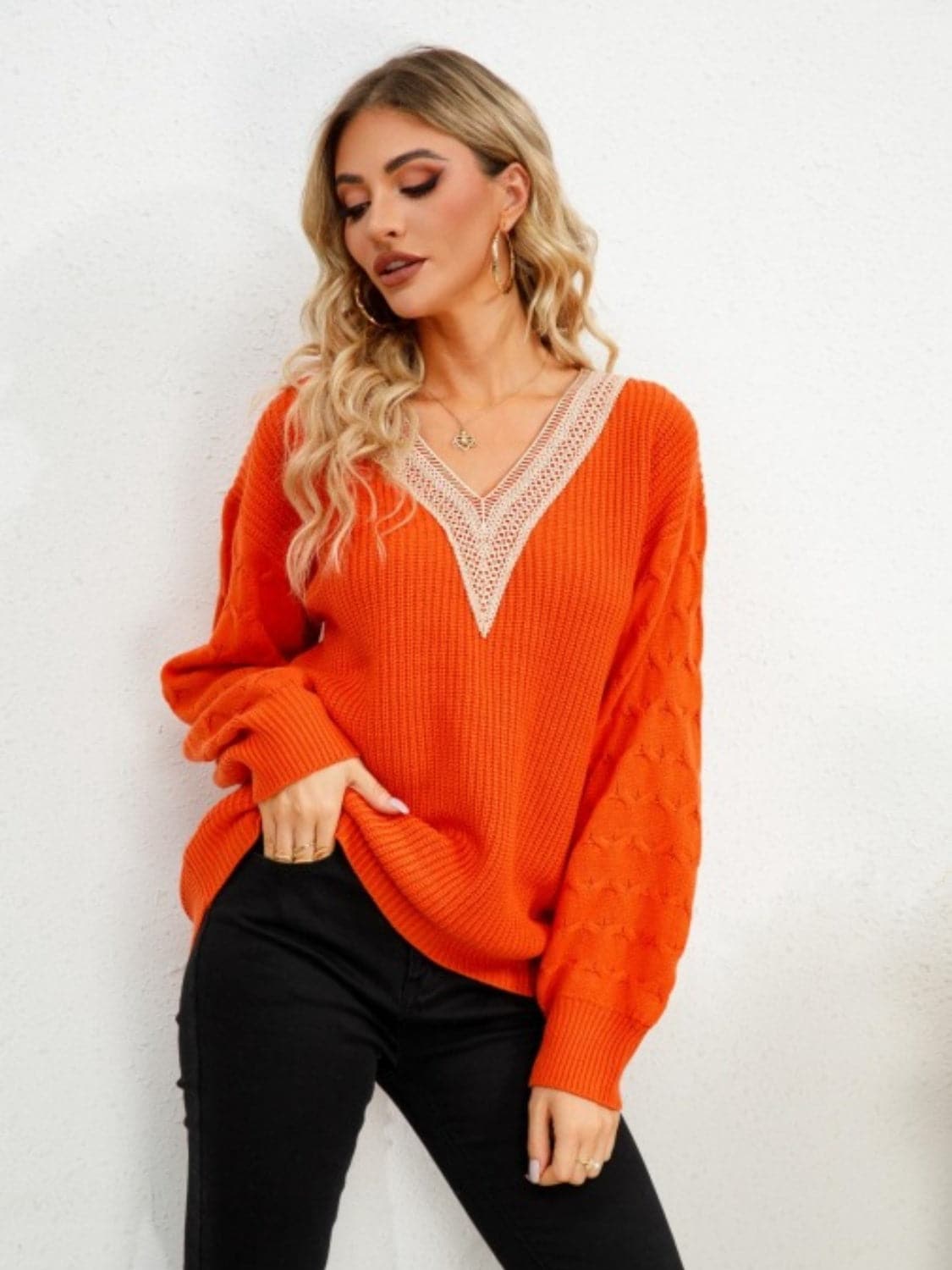 Dropped shoulder v-neck sweater with long sleeves