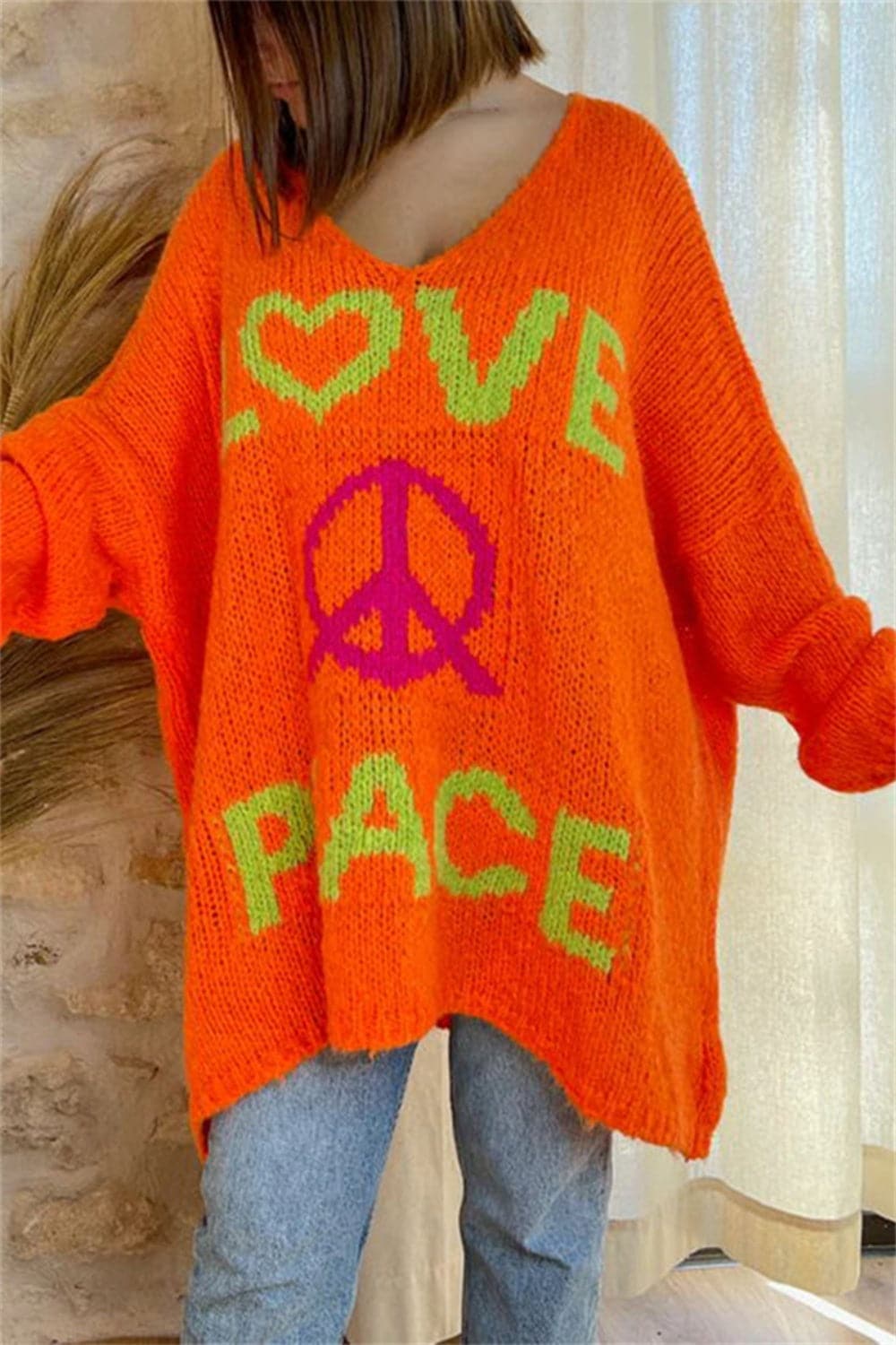 Peace Graphic V-Neck Long Sleeve Sweater.