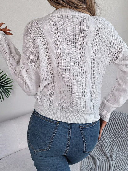 Cable-Knit Buttoned Round Neck Sweater.