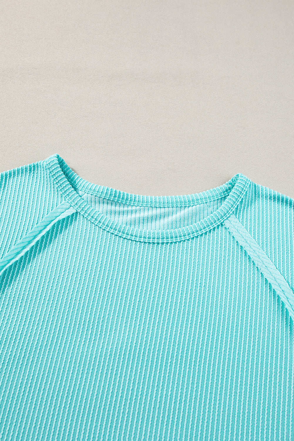 Light blue ribbed t-shirt with exposed seams for plus size comfort