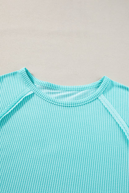 Light blue ribbed t-shirt with exposed seams for plus size comfort