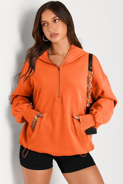 Sheer pocketed half zip hoodie for a stylish look