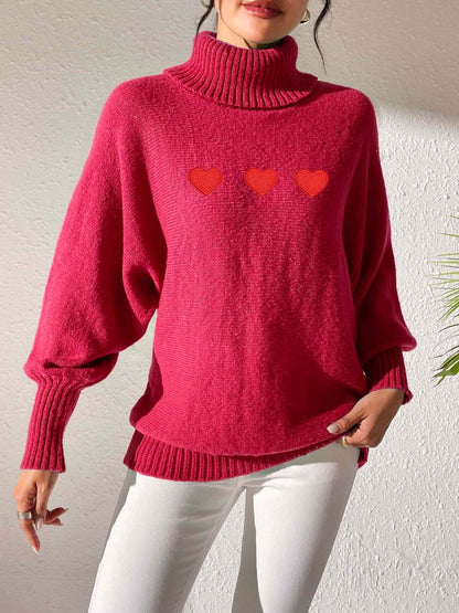 Charming heart-patterned turtleneck sweater with long sleeves