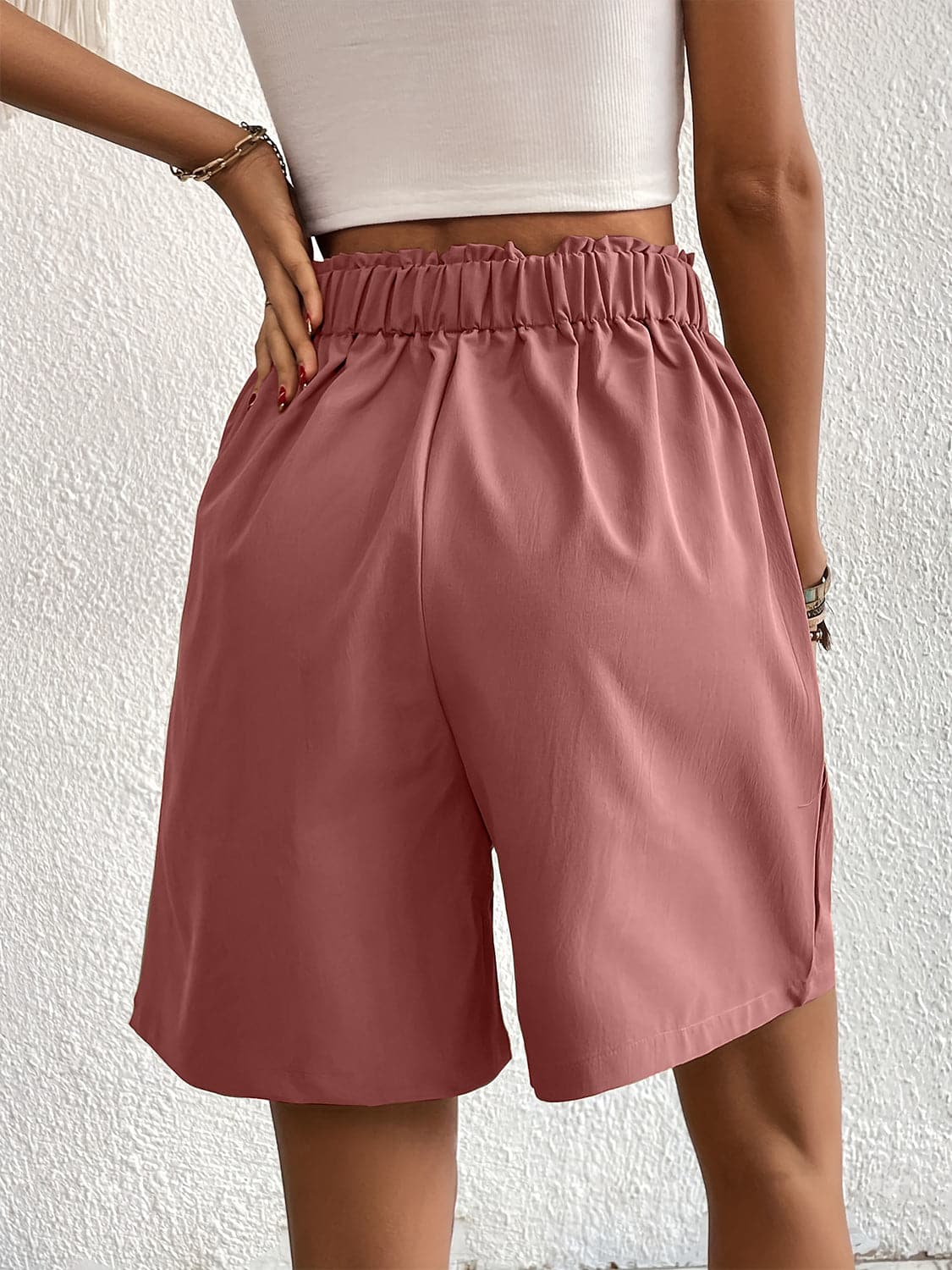 Pocketed Half Elastic Waist Shorts.