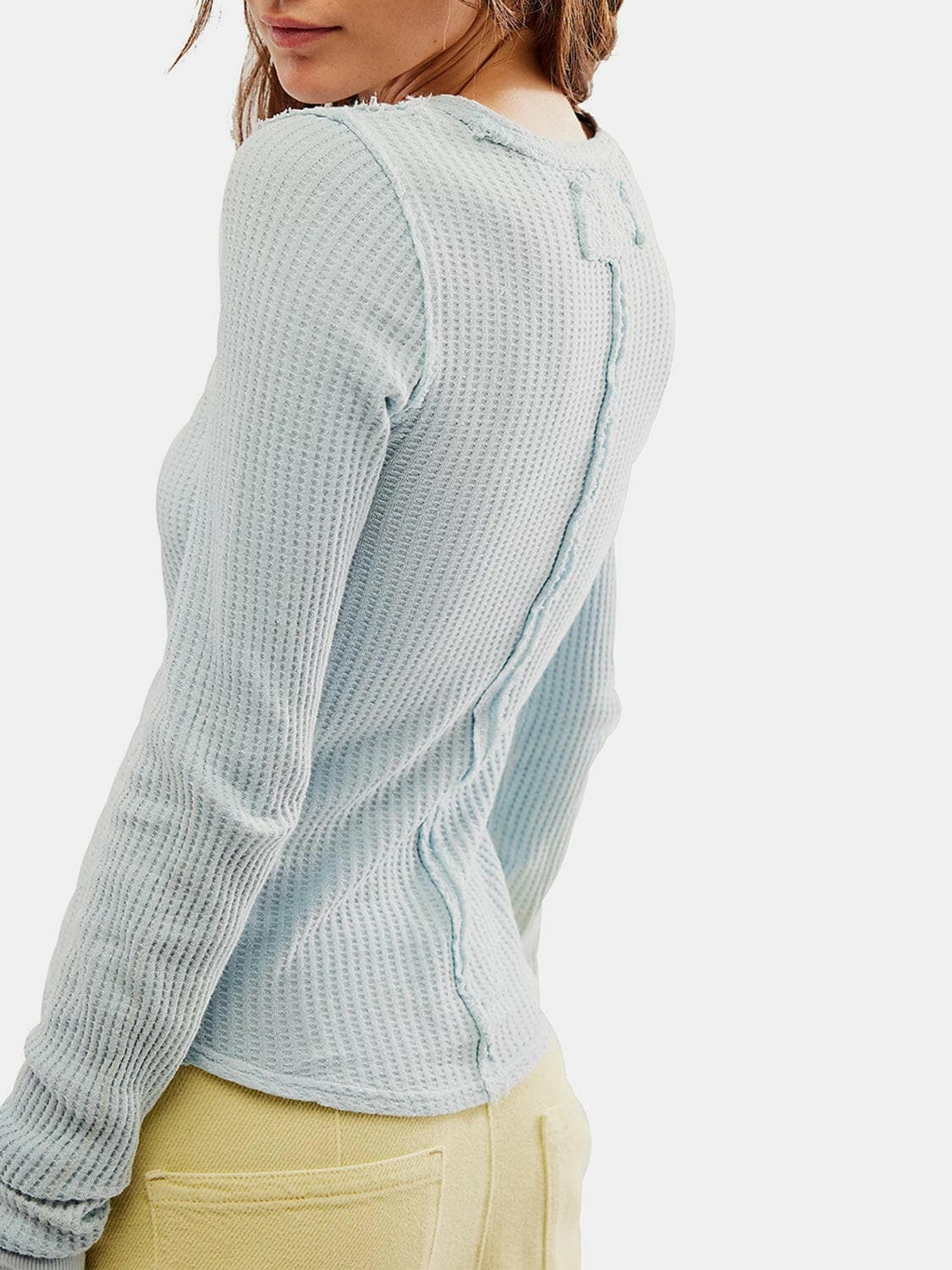 Exposed Seam Round Neck Long Sleeve T-Shirt.