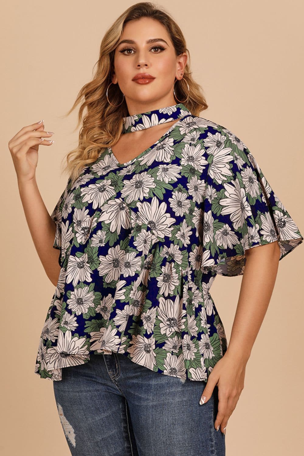 Plus Size Floral Flutter Sleeve Cutout Blouse.