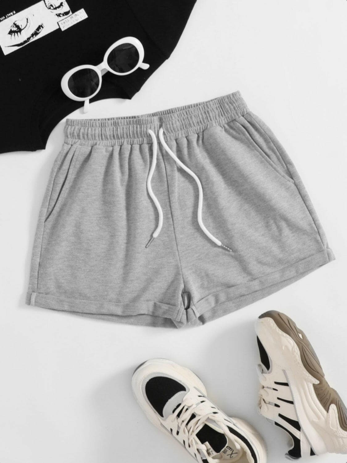 Drawstring Pocketed Elastic Waist Shorts.