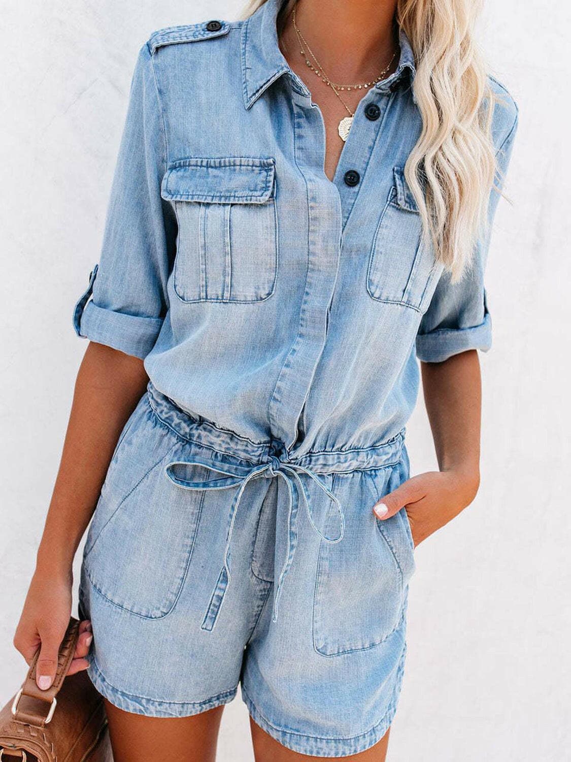 Chic denim drawstring half button half sleeve romper for versatile style and comfort.