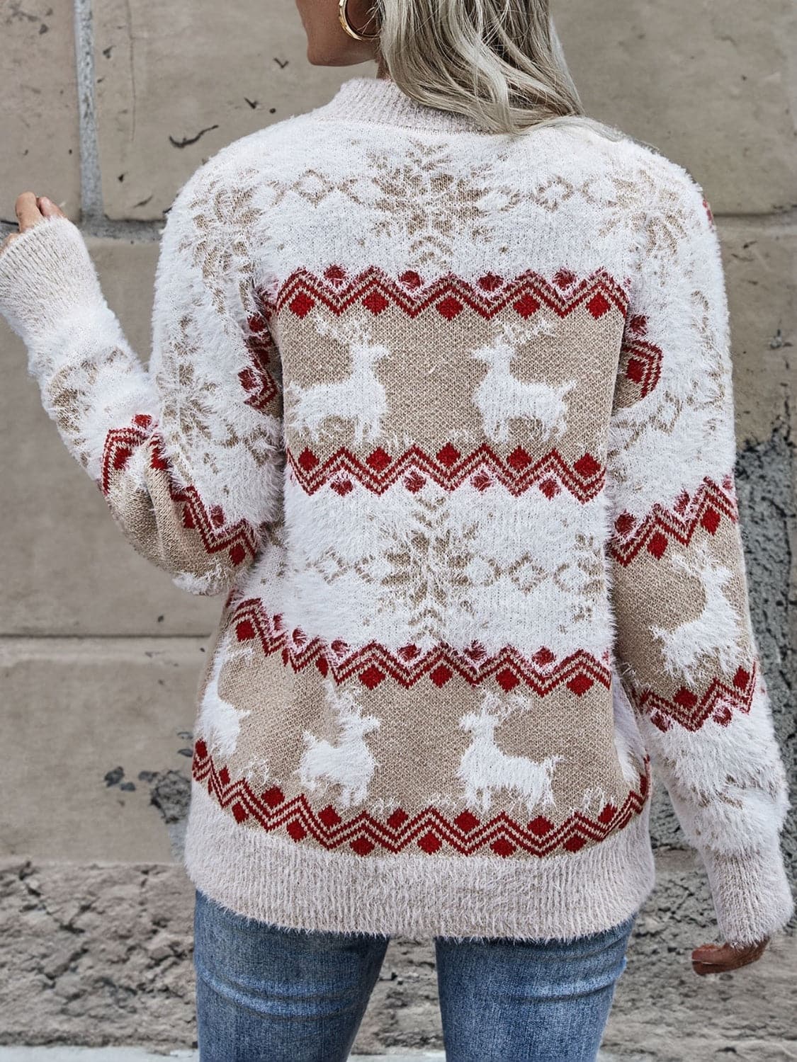 Reindeer & Snowflake Round Neck Sweater.