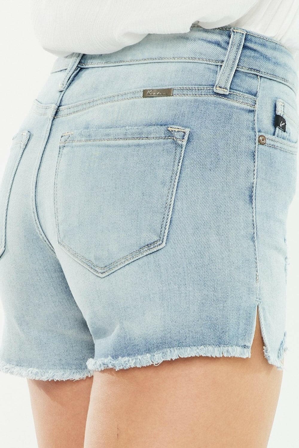 Kancan High Rise Side Slit Denim Shorts.