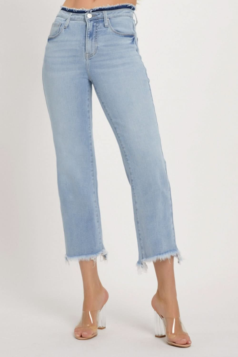 Edgy high rise cropped jeans with raw hem detail