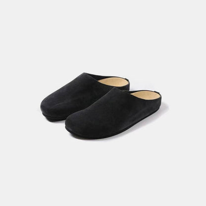 Suede slip-on flats with a round toe design