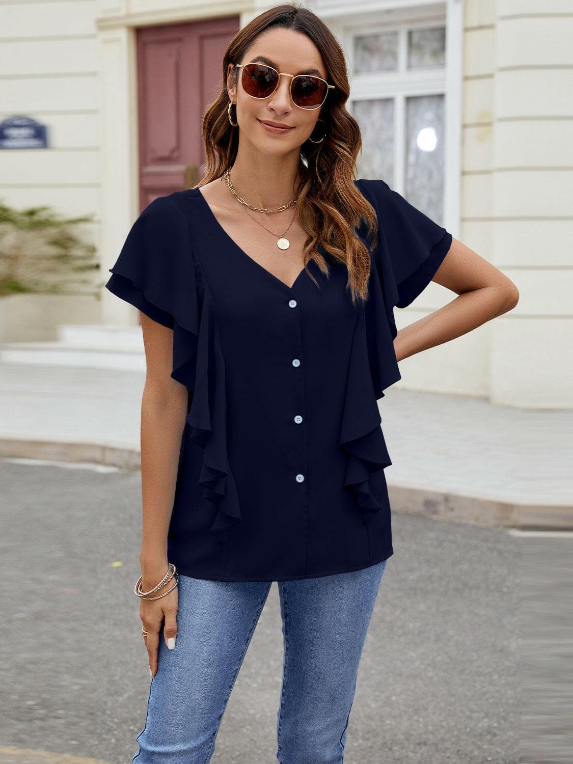 Ruffled V-Neck Short Sleeve TopRuffled V-Neck Short Sleeve Top

Introducing our elegant Ruffled V-Neck Short Sleeve Top, a must-have addition to your wardrobe for a touch of sophistication and styLove Salve -Neck Short Sleeve TopT-Shirts