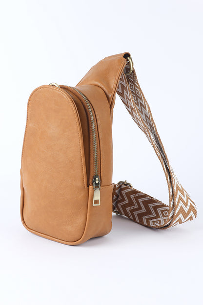 Stylish brown faux leather crossbody bag with secure zip closure