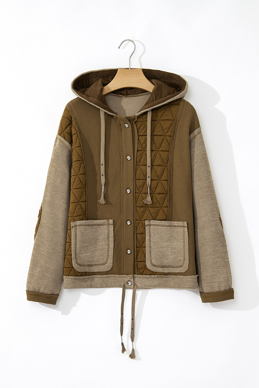 Cozy jungle green quilted hooded jacket with a stylish patchwork design