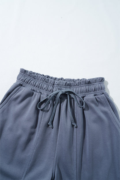 Trendy harem pants with lace-up waist