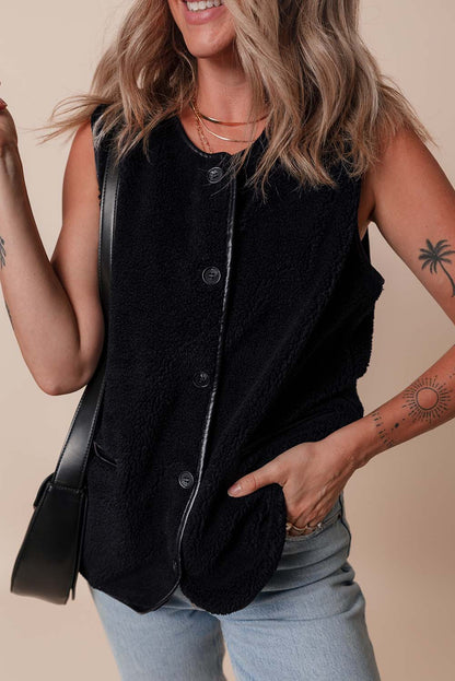 Sophisticated black fleece vest with button closure and side pockets