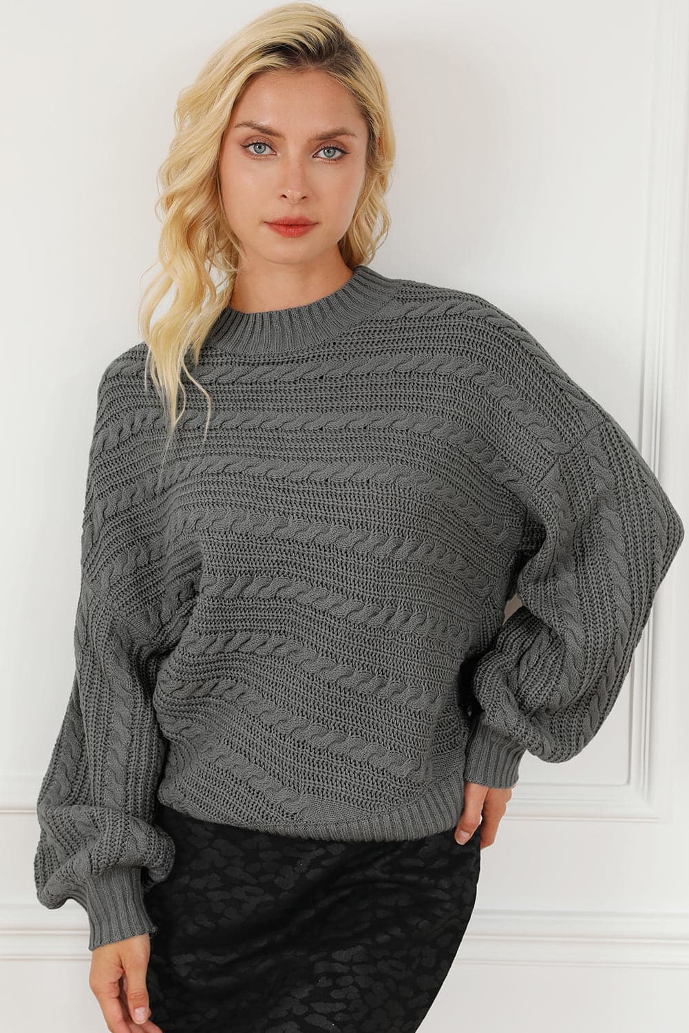 Cable-Knit Mock Neck Dropped Shoulder Sweater.