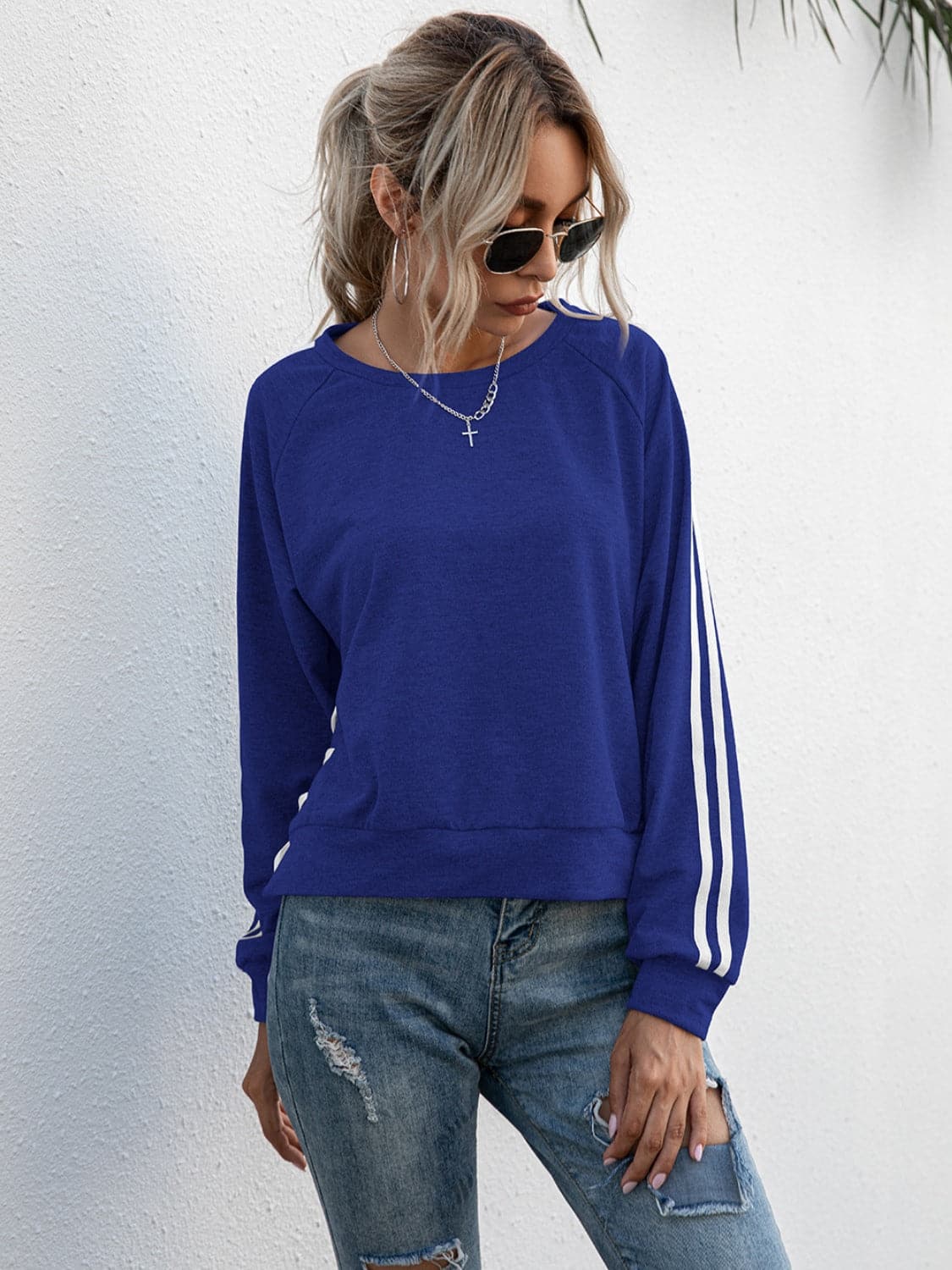 Lace-Up Round Neck Long Sleeve Sweatshirt.