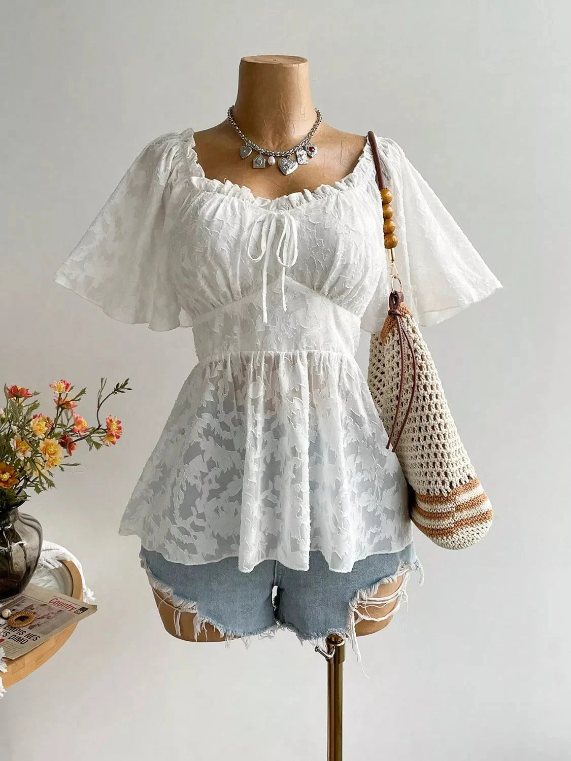Plus Size Floral Flutter Sleeve Blouse with Smocked Back Coco’s Tee Boutique