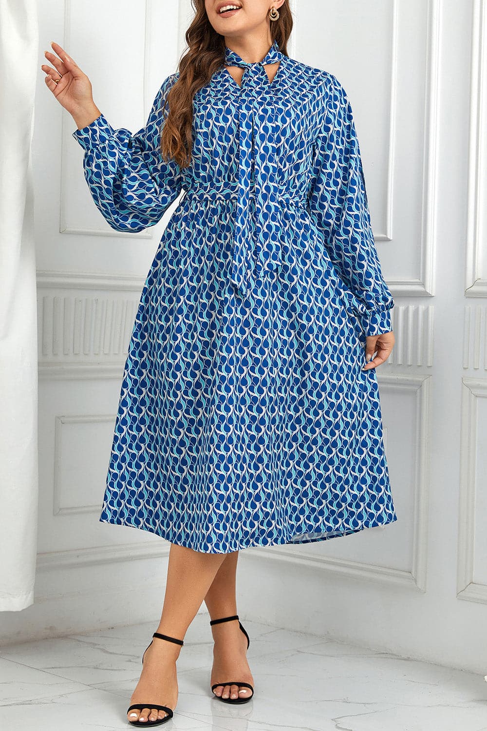 Plus Size Printed Tie Neck Midi Dress.