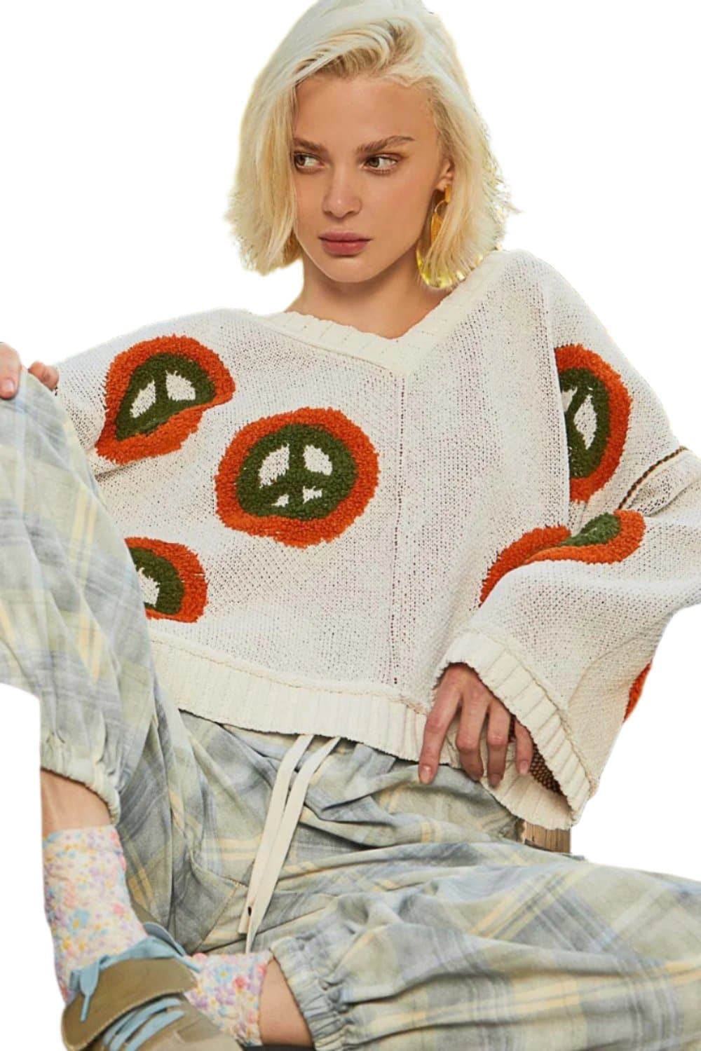 V-neck long sleeve sweater with peace pattern