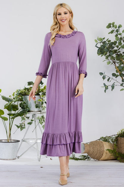 Celeste ruffle hem dress with pockets in purple, A-line silhouette with 3/4 sleeves, and ruffle layered hemline.