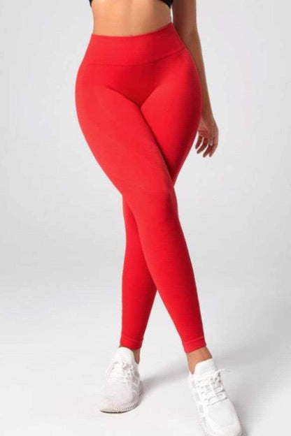 Red high waist active trousers for women, sporty and slim fit.