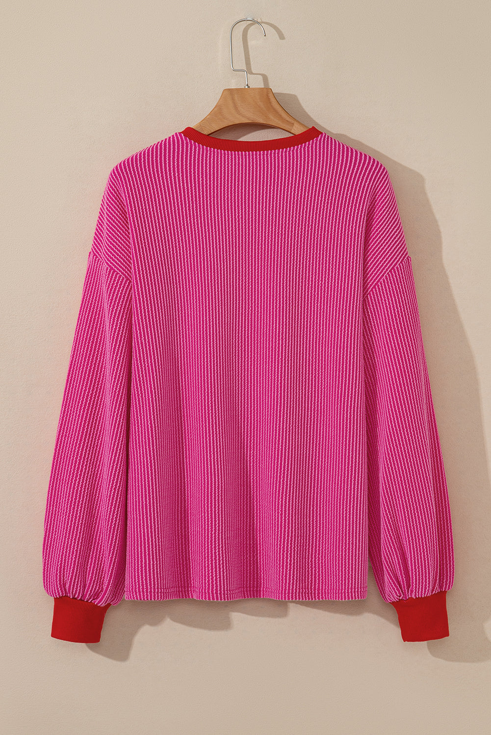 Bright pink drop shoulder top