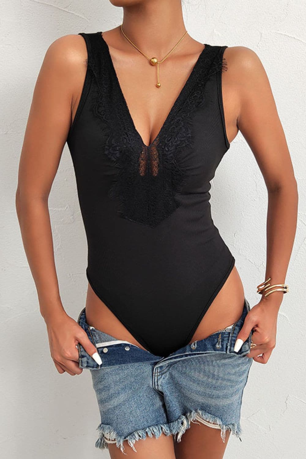 Spliced Lace Deep V Sleeveless Bodysuit.