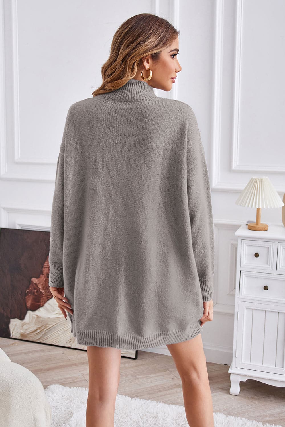 Exposed Seam Mock Neck Slit Sweater.