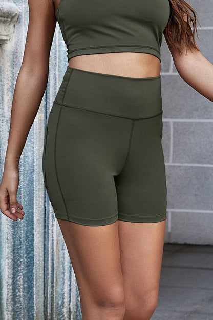 Exposed Seam Decorative Button Yoga Shorts.