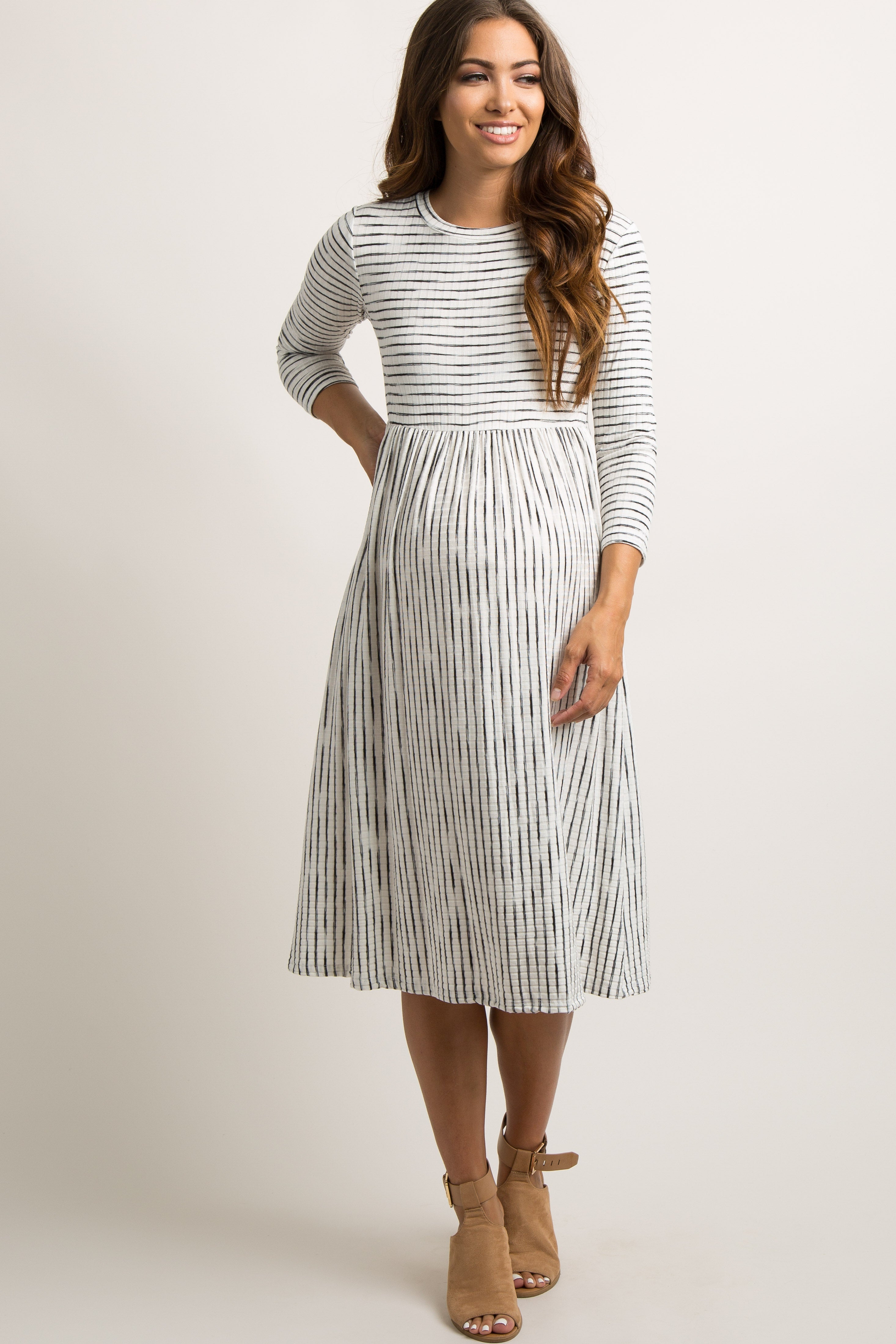 PinkBlush Ivory Ribbed Striped Maternity Midi Dress, full view, showcasing its elegant design and comfortable fit for pregnan