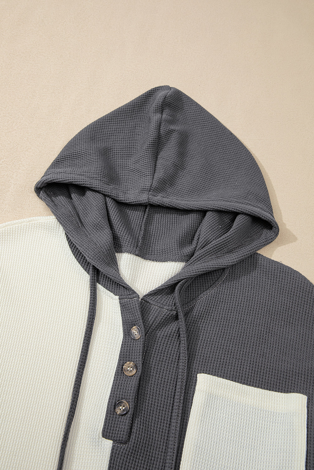 Stylish dark grey colorblock hoodie with button placket and drawstring