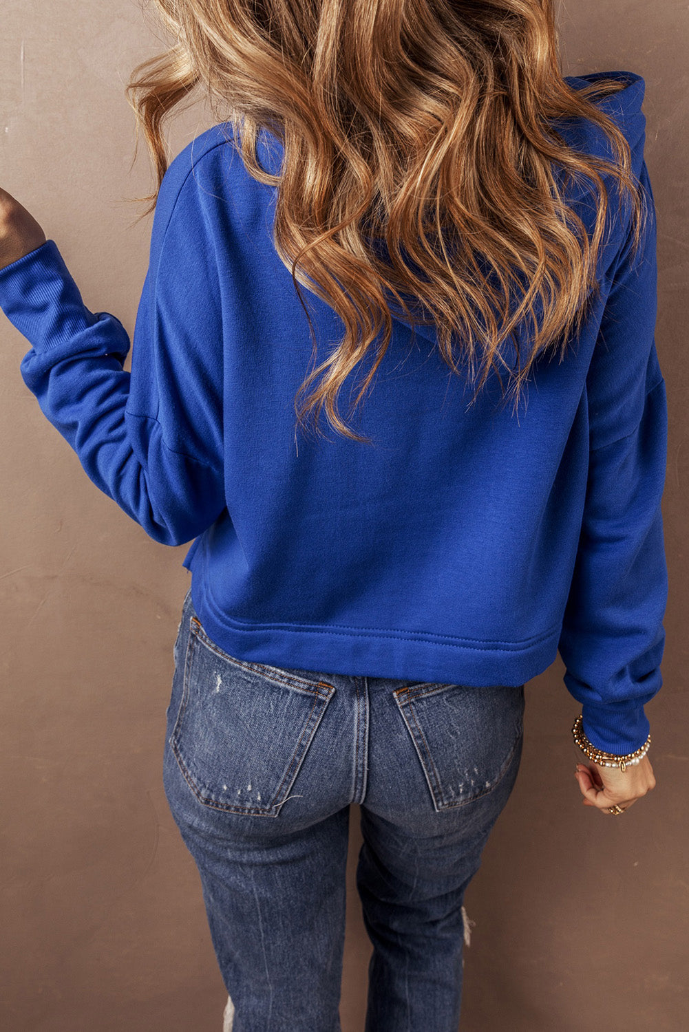 Chic dark blue cropped hoodie with drawstring hood and drop shoulder design