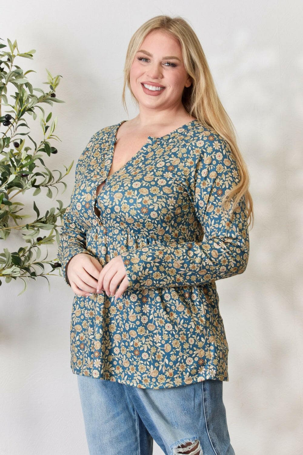 Heimish Full Size Floral Half Button Long Sleeve Blouse.