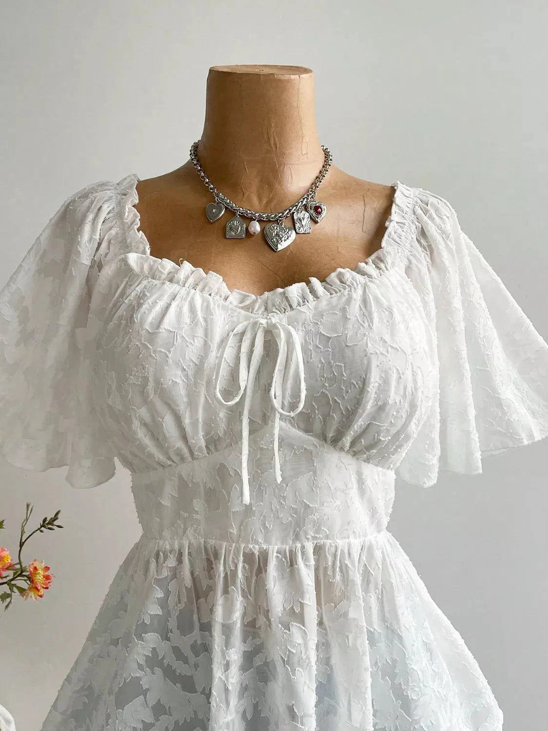 Plus Size Floral Flutter Sleeve Blouse with Smocked Back Coco’s Tee Boutique