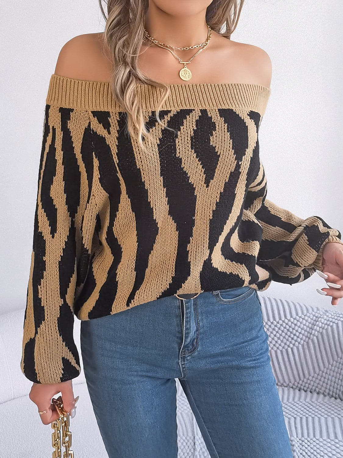 Off-Shoulder Animal Print Long Sleeve Sweater.