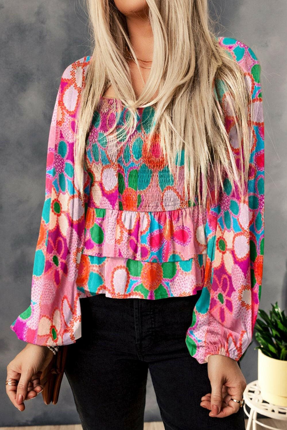 Floral Smocked Ruffled Balloon Sleeve Blouse with colorful patterns and chic design.