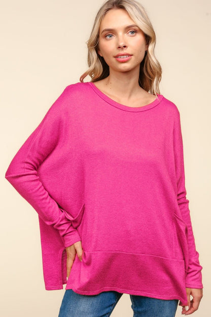 Cozy oversized knit top with pockets and dolman sleeves