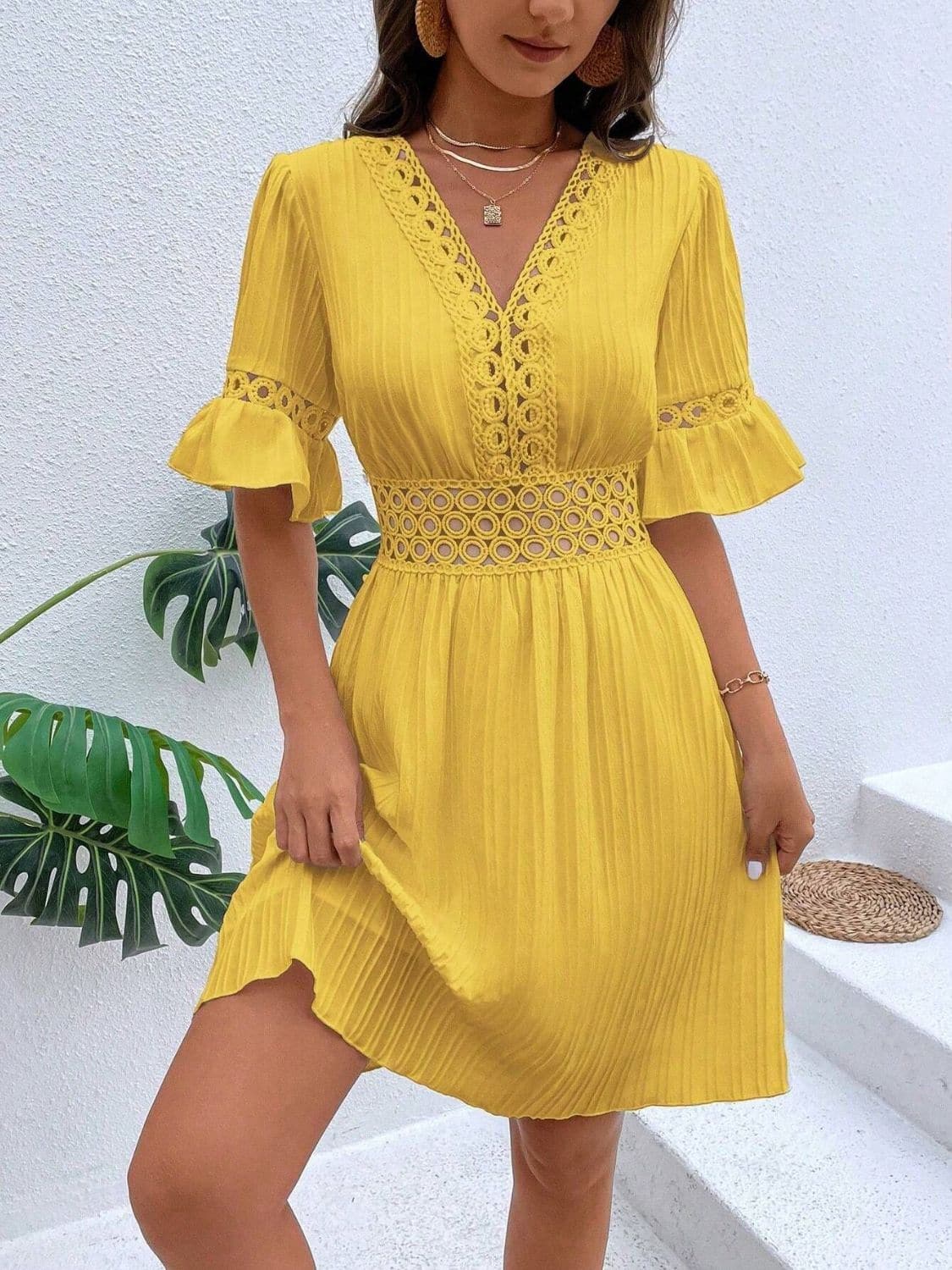 Cutout V-Neck Flounce Sleeve Mini Dress.