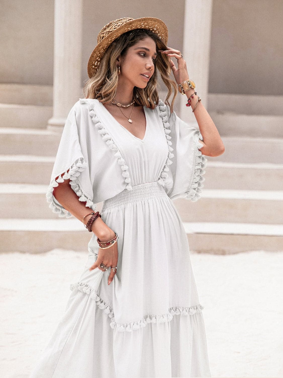 Tassel Trim Smocked V-Neck Short Sleeve Dress.