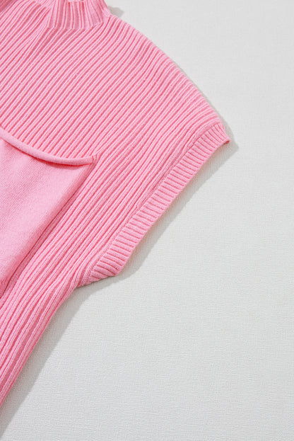 Cozy pink ribbed knit sweater with patch pocket and short sleeves