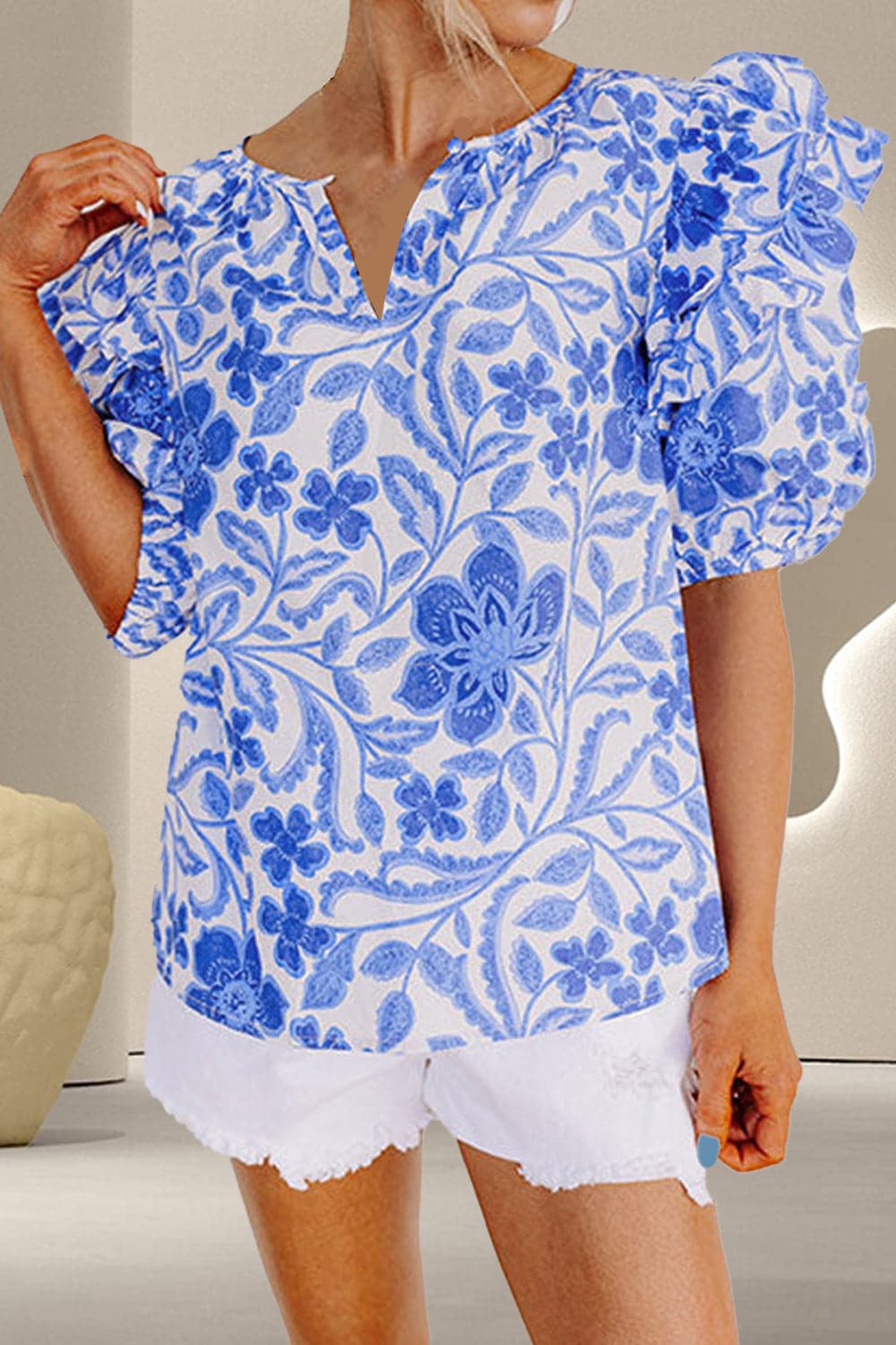 Printed Notched Half Sleeve Blouse.