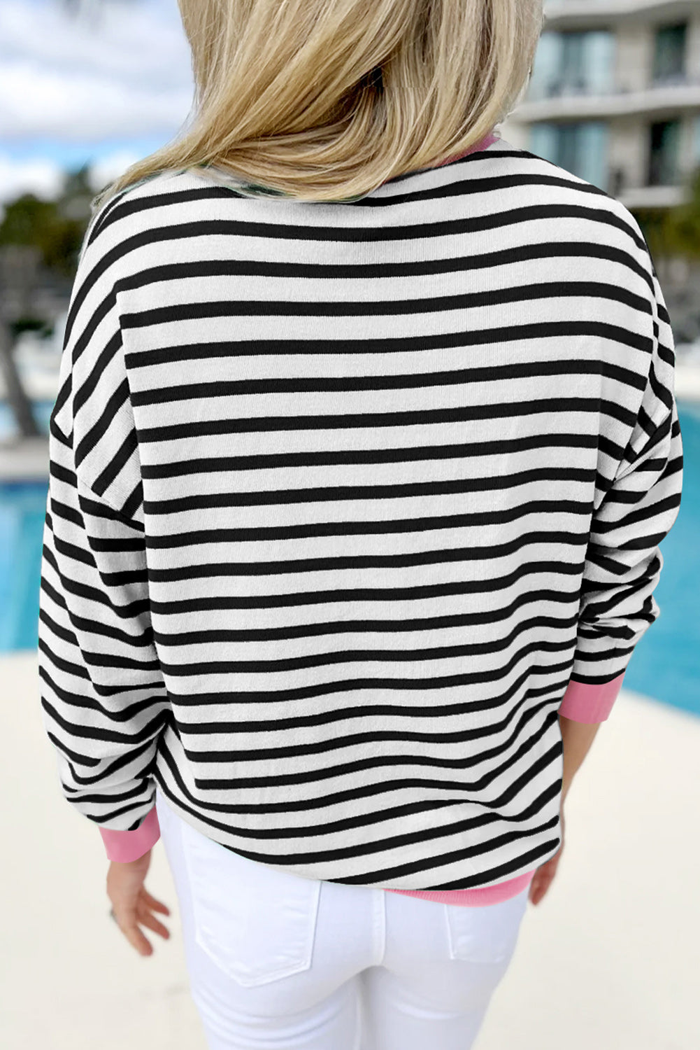 Chic black striped long sleeve top with contrast edges